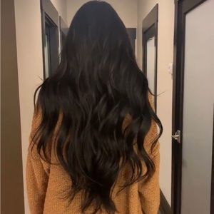 12 wefts of 24” black handtied hair extensions 2 rows.